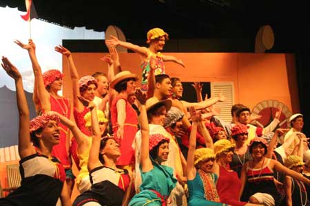 'Peach on the Beach' Julia Addis-Lieser (Nanette) being lifted here with the Chorus