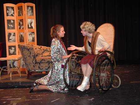 Dorothy Brock (Candace Scholz) giving Peggy Sawyer (Kathleen Wheeler) advice before the curtain goes up on 'Pretty Lady.'