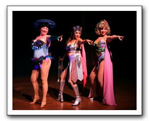 Jennifer Strand as Electra, Kathy Sanders as Mazeppa, and Ashley Edmiston as Tessie Tura