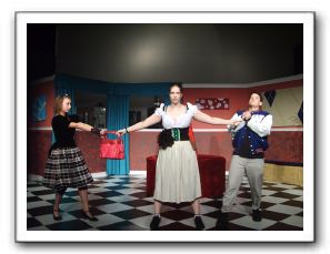 Marianne (Ashley Cornett), Dorine (Alexia Poe) and Valere (Will MacLeod)