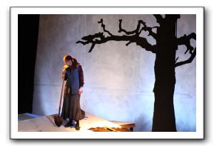 Kelley Slagle as Hester Swane digs a grave