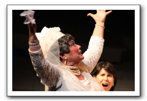 Carol Randolph as Mrs. Kilbride making a wedding speech; Susan Holliday is in the background