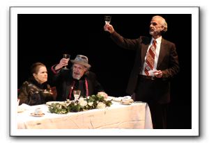 Mark O'Brien, right, and Jan Forbes toast the bride and groom at the wedding feast