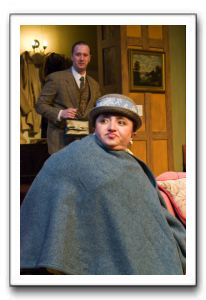 Suzanne Richard as the imperious Mrs. Boyle arrives at Monkswell Manor as proprietor Giles Ralston, played by John Stange, tries to cope.