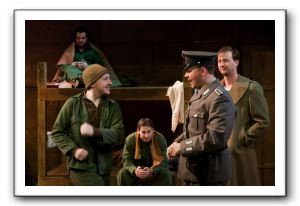 Shapiro (Donald Osborne) entertains Shultz (Hans Dettmar) 