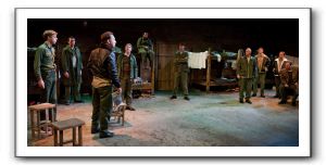 The soldiers of bunker 17 confront Sefton (Tony Bullock) 