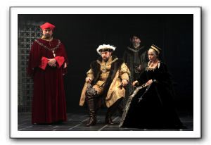 Anthony Cochrane (Cardinal Wolsey), Ian Merrill Peakes (King Henry VIII), Lawrence Redmond (Duke of Norfolk), and Naomi Jacobson (Queen Katherine)