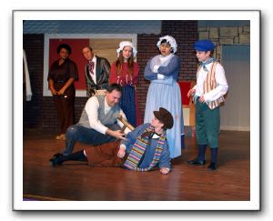 Maria Simpkins (The Ghost of Christmas Past), Steve Izant (Ebenezer Scrooge), Kathleen Lovain (Cratchit Child 1), Aimee Meher-Homji (Gladys Cratchit),