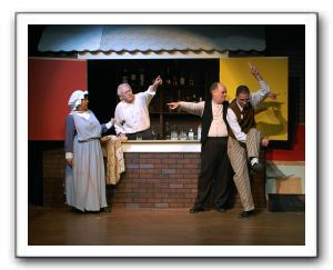 Aimee Meher-Homji (Gladys Cratchit), Gary Stephans (Bartender), Kevin Harr (Gentleman in Bar), and Geoff Baskir (Gentleman in Bar)