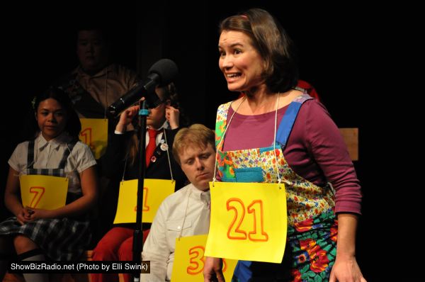 Spelling Bee contestant Olive (played by Chrissy Barnett Miller) takes her turn. Also pictured, Kim Frias, Alden Michels, Katrina Janson,and Doe Kim.
