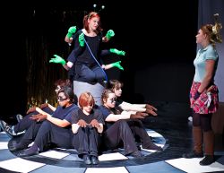 Devan Daly as The Caterpillar and Claire Quin as Alice. Caterpillar arms: Chris Diaz and Olivia Whitham.