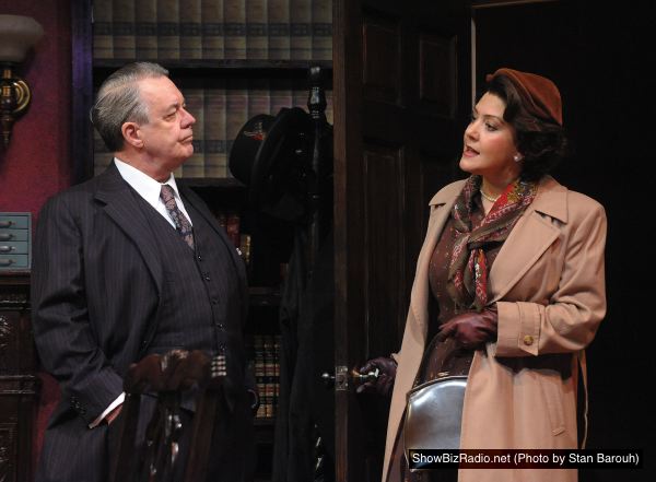 James Slaughter as Mr. Mayhaw and Andrea Cirie as Romaine