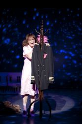 Anika Larsen (as Penny Maple) enjoys a moment alone at the office, singing 'As Long As You Are Here'