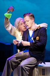 Professor Von Golum (Thomas Adrian Simpson) coaxes Billy Argo (Stephen Gregory Smith) into helping him solve a riddle