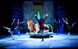 Maugrim the Wolf (Dylan Keane - center)  and the White Witch's minions taunt Aslan