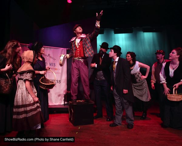 Ben Ribler (Toby) and Ensemble