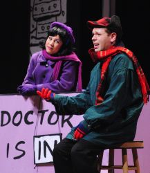 The doctor's in! Lucy (Janine Sunday) helps Charlie Brown (Zack Colonna) work through some of his 'issues'