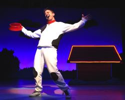 Snoopy (James Gardiner) sings about the joys of 'Suppertime'