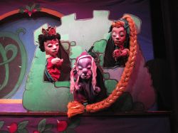 Witch Wartsmith tries to keep Rapunzel our of the hands of a handsome Prince