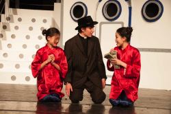 Ryan Savage (as Moonface Martin) 'reforms' Lauren Eng (left, as Ching) and Makiko Miyazaki (as Ling)