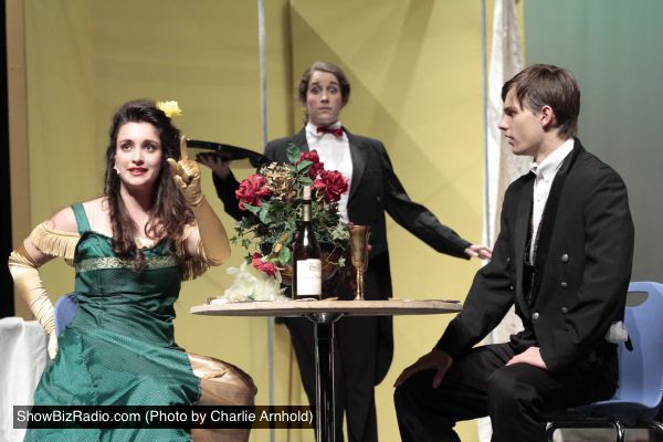Alexandra Nicopoulos (Dolly Levi), Olivia Ballard (Waiter), and Doug Klain (Horace Vandergelder)