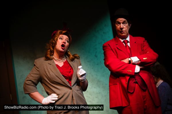 Gloria Thorpe (Janette Moman) interviews Applegate (Mike Baker)