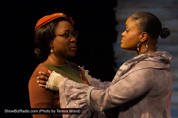 The Civil Rights Marcher (Ines Nassara, left) finds solace in the words of the Unknown Woman (Nova Y. Payton)