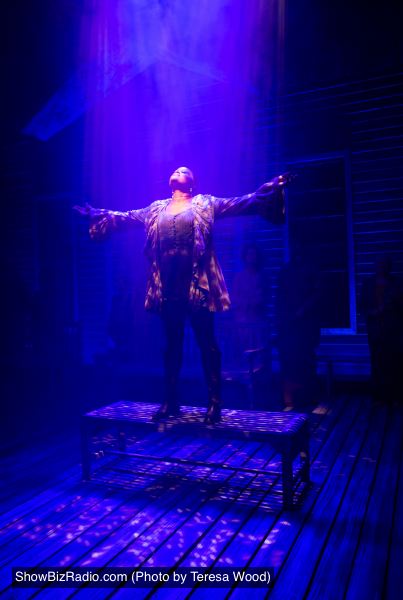 The Unknown Woman (Nova Y. Payton) endows the train station with a touch of magic