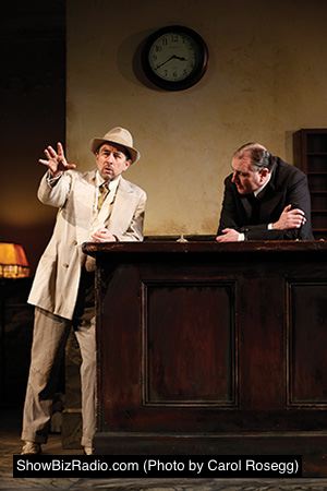 Richard Schiff as Erie Smith and Randall Newsome as Night Clerk