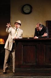 Richard Schiff as Erie Smith and Randall Newsome as Night Clerk