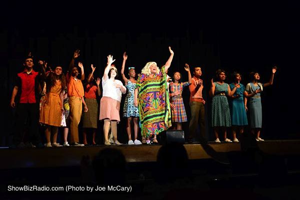 In the climax of 'I Know Where I've Been,' Motormouth Maybelle (Aaliyah Dixon) inspires Tracy, Link, Penny, her children Seaweed & Little Inez and all the members of the Detention Ensemble and the Dynamites (far right)