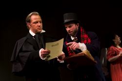 Scrooge (Brent Stone) and Crachit (Bill Walker)
