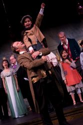 Scrooge (Brent Stone) & Tiny Tim (Sophia Houdaigui)