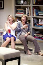 Vanessa Lock (left, as Annette) and Naomi Jacobson (as Veronica) share a laugh and a drink.