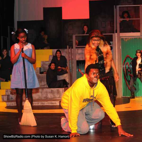 Adhana Reid (Dorothy), TreVaughn Allison (Lion), and LeAnn Dunn (Wicked Witch of the West Evillene)
